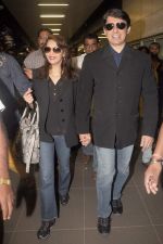 Madhuri dixit snapped with husband in Mumbai Airport on 6th April 2012 (20).jpg